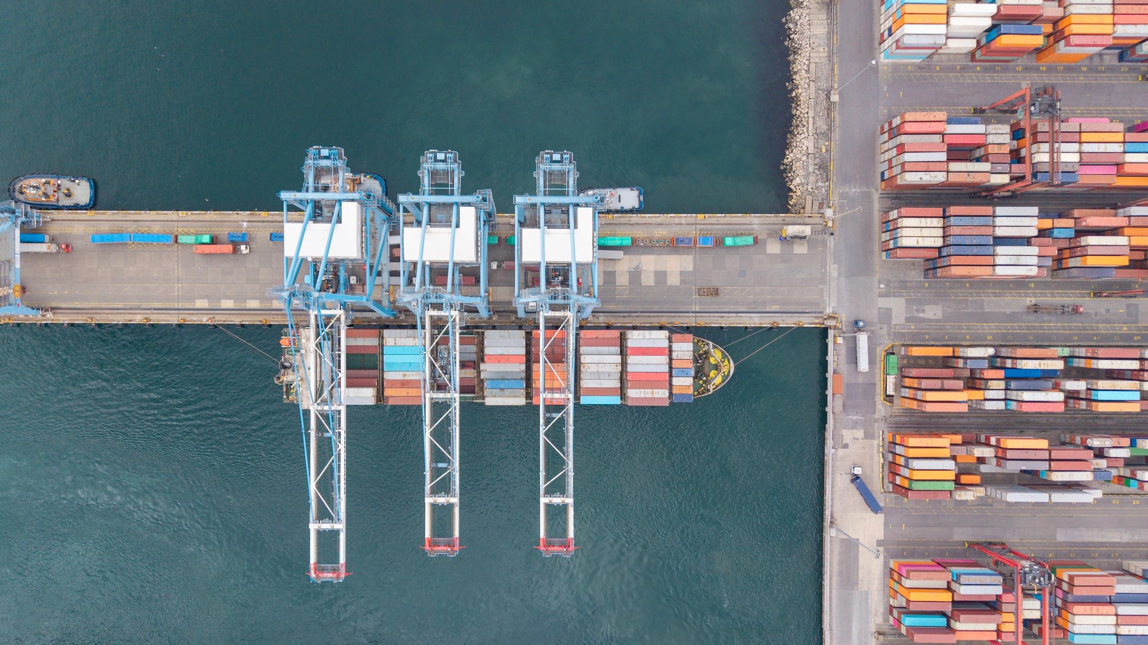 Container ship being loaded at a commercial port